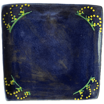 Pottery design with blue background with yellow mimosa/cornflower design.