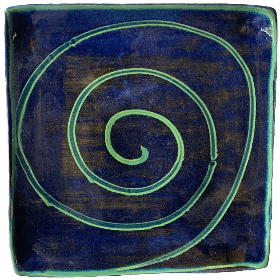 Square pottery design with blue background with green swirl.
