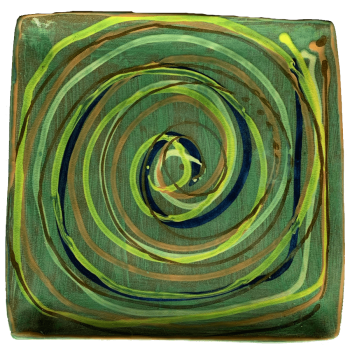 Ceramic pottery design with green background with many colors of swirls.