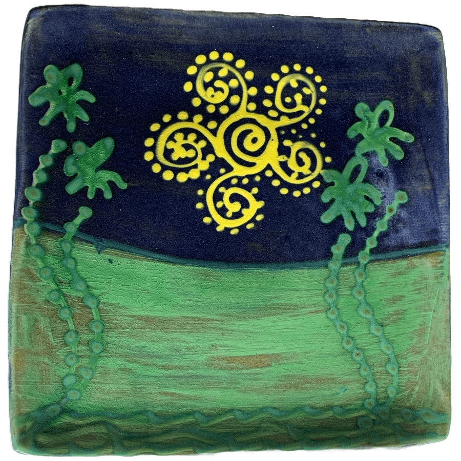 Square ceramic pottery design with evocative sun and palm tree design.